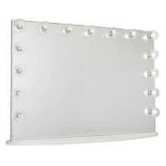 a large white lighted mirror with bulbs on it