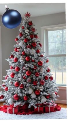 a christmas tree with red and white ornaments