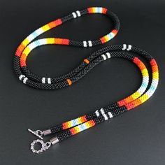 Native American beaded necklace black beaded jewelry for women, anniversary gift for grandma, aboriginal totemATTENTION* I have worked out the product packaging , so it will come to you without damage, otherwise you can return itPRODUCT SPECIFICATIONS*SIZE: Lanyard length : 104 cm 41.6 inc* At the ends of the product, metal fittings are stainless steel, will not darken with time. * ! Please be careful with this necklace. Jewelry should be kept out of the reach of children and Pets. Contact with Black Bohemian Beaded Necklaces With Tiny Beads, Adjustable Black Hand-strung Beaded Necklaces, Black Hand-strung Beads As Gift, Black Hand-strung Beads Gift, Gift Hand-strung Black Beads, Hand-strung Black Beaded Necklaces For Festivals, Black Hand-strung Beaded Necklaces For Festivals, Black Hand-strung Beaded Necklace For Festivals, Festival Hand-strung Black Beaded Necklaces