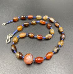 A beautiful collection of Old Agate beads originating from Nagaland good condition we provide fast and free shipping service world wide Polished Oval Agate Beads, Oval Agate Gemstone Beads, Carnelian Beads, Feb 5, Agate Beads, Gold Beads, Necklace Designs, Quartz Crystal, Beautiful Design