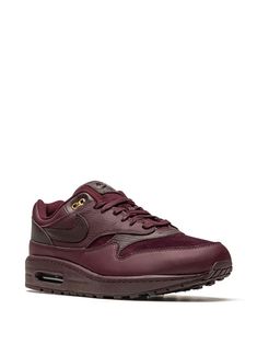 "Find NIKE Air Max 1 \"\"burgundy Crush\"\" Sneakers on Editorialist. burgundy calf leather signature Swoosh logo detail panelled design branded insole panelled design branded insole front lace-up fastening These styles are supplied by a premium sneaker marketplace. Stocking only the most sought-after footwear, they source and curate some of the most hard to find sneakers from around the world." Nike Leather Sneakers With Air Max Cushioning, Burgundy Low-top Sneakers With Boost Midsole, Sporty Burgundy Sneakers With Boost Midsole, Burgundy Low-top Sports Sneakers, Burgundy Low-top Sneakers For Sports, Sporty Burgundy Sneakers For Sports, Sporty Burgundy Sneakers, Burgundy Sporty Sneakers For Sports, Burgundy Sneakers With Cushioned Footbed For Streetwear