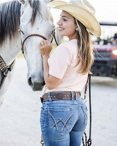 A BOOTCUT BRIMMING WITH RETRO VIBES Mae places a contemporary twist on our cowgirl cool aesthetic. All Wrangler® jeans for women are designed to accentuate your best assets, but our women's Retro® jeans go above and beyond. Wrangler® Retro® jeans pay tribute to our Western heritage with the iconic details you know and love, including the leather patch and authentic "W" stitching on the back pockets. Plus, these women's bootcut jeans come with a figure-flattering, mid-rise fit that's truly versat Cool Aesthetic, Retro Jeans, Womens Jeans Bootcut, Country Women, Jeans For Women, Wrangler Jeans, Best Jeans, Above And Beyond, Boot Cut Jeans