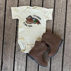 Your little one will make a splash in our **Kinda a Big Teal Big Deal Duck Hunting Infant Bodysuit This cozy bodysuit is perfect for the tiniest hunting partner. Whether it's for daddy's future duck hunting buddy or as a thoughtful gift for a country-loving family, this bodysuit celebrates the outdoor lifestyle with adorable flair. Made from soft, breathable fabric for all-day comfort, it's a must-have for baby's first hunting season or as a standout baby shower gift! ---Shirt Color--- This body Liquid Fabric Softener, Hunting Gifts, Loving Family, Hunting Season, Duck Hunting, Blue Teal, Outdoor Lifestyle, Big Deal, Gender Neutral Baby