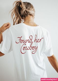 Celebrate your love story with our adorable "Found Her Cowboy" graphic tee. Perfect for brides-to-be, this comfy and stylish shirt features a charming design that captures the essence of your special day. Pair it with jeans or a skirt for a cute and casual look. Cowboy Graphic, Pilates Socks, Bachelorette Ideas, Cowboy Shirt, Cowboys Shirt, Stylish Shirt, Stylish Shirts, Trending Now, Bridal Accessories