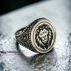 Lion Head Ring Handmade 925 Silver Men Ring , 925 Silver Turkish Handmade Jewelry , Gift for Him , Birthday Gift , Anniversary Gift , Easter Gift , Father's Day Gift , Same Day Free Fast Shipping ✓ PRODUCT FEATURES : ✧ Handmade Item ✧ Materials: 925 Sterling Silver ✧ We send it together with a Cebeci Silver gift box, a silver cleaning cloth and a surprise gift. ✧ Ring Weight : 7,5 Grams  ✓USAGE DETAILS : * Silver jewelry is very sensitive to chemicals. It is recommended to keep away from chemica Engraved Antique Silver Signet Ring, Silver Signet Ring For Father's Day, Silver Round Signet Ring For Father's Day, Silver Engraved Rings For Father's Day, Father's Day Silver Engraved Ring, Father's Day Engraved Silver Rings, Custom Handmade Silver Signet Ring, Classic Handmade Rings In Antique Silver, Engraved Signet Ring For Father's Day