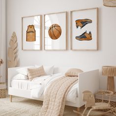 a bedroom with three framed basketballs on the wall