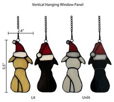 three different types of windows with santa hats hanging from the top, and one wearing a santa hat