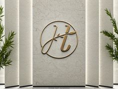 the logo for jlt is displayed on a wall