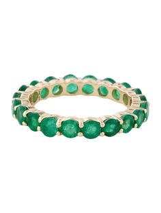 Adorn your finger with the timeless elegance of this 14K yellow gold eternity band, featuring a stunning array of emeralds. Perfect for special occasions or adding a touch of luxury to everyday wear, this ring is a true symbol of eternal beauty. Details: * SKU: DAN-124E * Stock ID: RRING265069 * Material: 14K Yellow Gold * Marks: 14K, Maker's Mark * Total Item Weight: 2.7g * Band Width: 3.4mm * Gemstones: * Type: Emerald * Total Carat Weight: 2.02ctw * Stone Count: 20 * Stone Shape: Round Modified Brilliant * Stone Color: Green * Type/Clarity: Moderately Included * Size: 6.75 This exquisite eternity band is crafted from high-quality 14K yellow gold, ensuring durability and a luxurious appearance. The band is set with 20 round modified brilliant emeralds, totaling 2.02 carats. Each emerald Emerald Eternity Band, Gold Eternity Band, Eternal Beauty, Eternity Band Ring, Maker's Mark, Eternity Band, Eternity Bands, Makers Mark, Band Ring