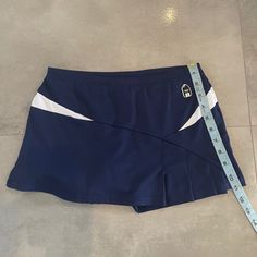 Navy Blue Duc Tennis Skirt. No Tags But Never Worn Navy Stretch Lined Skirt Bottoms, Sporty Blue Mini Swim Skirt, Sporty Short Blue Skirt, Navy Lined Skirted Skort, Blue Fitted Sporty Skirt, Sporty Fitted Blue Skirt, Tennis Skirt, Tennis, Blue White