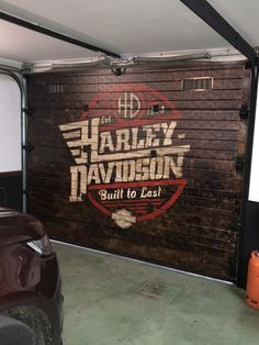 a garage door with the words harley davidson built to last painted on it