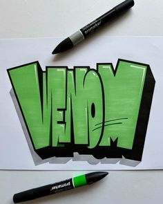 a piece of paper with the word veno written on it and a marker next to it