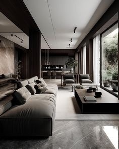 a modern living room with black and white furniture