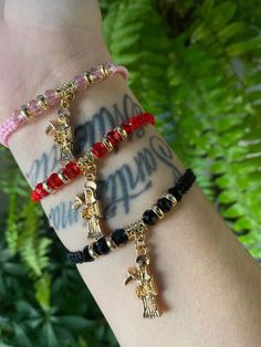 Santa Muerte bracelet Border Hopper, Dark Tattoos For Men, Lauren London Nipsey Hussle, Dark Tattoos, Wedding Bracelets, Nipsey Hussle, Lauren London, Bling Acrylic Nails, Dark Tattoo