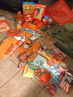 an assortment of candy and candies on the floor