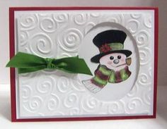 a close up of a card with a snowman wearing a top hat and scarf