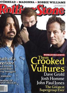 the cover of rolling stone magazine with two men standing next to each other and looking at something