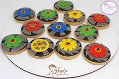 decorated cookies are arranged in the shape of flowers