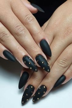 19 Chic Black Nail Ideas for Winter 2023-2024 - thepinkgoose.com Black Nail With Jewels, Matte Black Nails With Jewels, Black Pointed Nails Design, Black Almost Nails, Different Shades Of Black Nails, Black Stud Nails, Elegant Almond Nails Classy Black, Black And Crystal Nails, Dark Acyrilics Nails