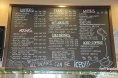 a blackboard with drinks and menus written on it