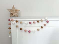 Felt wool ball garlands are a beautiful addition not only to children's nurseries or your home, but also for weddings, parties, baby showers and special occasions. This garland will add style and a splash of colour to a variety of settings - from mantelpieces, picture frames, shelving and walls to bookcases, curtain ties and toy boxes. The opportunities are endless!  The felt wool balls are all approx 2.5cm in diameter (there may be very slight variations as they are all handmade). You can space Colourful Playroom, Felted Wool Ball Garland, Room Shelf Decor, Kids Room Shelves, Garland Nursery Decor, Felt Wool Ball, Colorful Playroom, Garland Nursery, Pom Garland