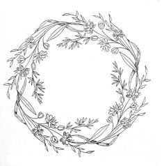 a black and white drawing of a flower wreath