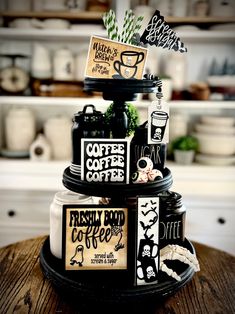 three tiered cake decorated with coffee related items