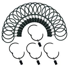 a bunch of black rings and hooks on a white background