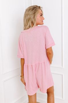 - Keep all eyes on your effortless style with this adorable romper! Short rolled sleeves and buttoned bodice is the epitome of summer charm. Whether you're strolling along the beach boardwalk or enjoying a rooftop brunch with friends, this versatile piece exudes casual elegance. Its playful silhouette offers a perfect balance between comfort and style, making it a must-have addition to your warm-weather wardrobe. Embrace the carefree spirit of the season in this irresistible ensemble - Unlined s Rooftop Brunch, Beach Boardwalk, Comfy Chic, Rolled Sleeves, Wooden Buttons, All Eyes, V Cuts, Casual Elegance, All About Eyes