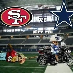 a man riding on the back of a motorcycle in front of a football field with a giant star