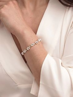 DESCRIPTION A luxe bracelet adorned with pearls and crystals. Complete your look with effortless sophistication, and don't be afraid to layer with other delicate bracelets. Also available in soft white gems: *Special Edition* Nigella Bracelet Get the perfect length: Chain Extender. Wear with: Blair Drops or Zoe Hair Pi Classic Pearl Jewelry, Wedding Accessories Jewelry, Wedding Jewelry Bracelets, Bridesmaid Bracelet, Chain Extenders, Don't Be Afraid, Stone Gold, Gold Jewellery Design, Hair Pin