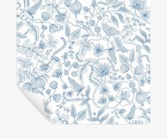 a paper with blue flowers and birds on it