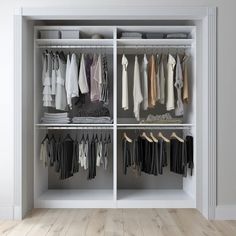 an open closet with clothes and shoes hanging on the walls, in front of a wooden floor