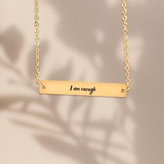 I am enough necklace At its core, the phrase is about self-acceptance and self-worth, and it's about understanding that you are worthy of love, respect, and all of the good things that life has to offer, just as you are. - Necklace Size: 45+5cm (17.7+2 inches) - Pendant Size: 6x39mm (0.24x1.54 inches) - Material: Stainless Steel, 18k Gold plated, or 18k Rose Gold plated - Personalization Technique: Laser engraving - Customizable: Can be engraved on the front and back Ready to Ship This personali Worthy Of Love, I Am Enough, Gravure Laser, You Are Worthy, Self Acceptance, Necklace Size, Minimalist Necklace, Necklace Sizes, 18k Rose Gold