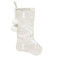 a white christmas stocking with pom poms