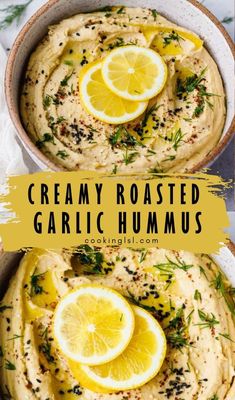 creamy roasted garlic hummus in a bowl with lemons and herbs on top for garnish