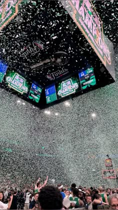 confetti is thrown in the air at a sporting event