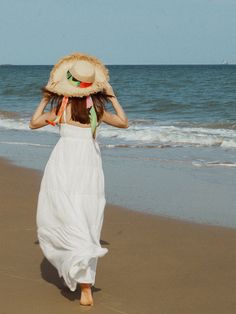 Inspired by our enchanting trip to Colombia and the vibrant nature of beautiful Cartagena, this straw hat, perfect for a beach hat showcases the lush flowers of this tropical city, radiating a summer and relaxing vibe. It is crafted from high-quality lightweight raffia and features a ribbon tie that allows you to adjust the fit to your liking. Product Description: Hat: 100% raffia; ribbon tie: 100% Polyester Digital printed with floral patterns on ribbon tie inspired by Cartagena 2 colors to cho Straw Boater Hat For Beach Season Picnic, Summer Boater Hat For Picnic, Coastal Straw Hat For Vacation, Wide Brim Palm Leaf Boater Hat For Beach, Curved Brim Straw Hat For Beach Season Picnic, Bohemian Natural Panama Hat For Garden Party, Bohemian Toquilla Straw Panama Hat For Day Out, White Coastal Straw Hat For Vacation, Curved Brim Straw Hat For Beach Season Picnics