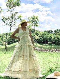 Handmade ruffled raw cotton dress with lining. Was $139 now on sale $105 Decorate with lace. Deep v neck, elastic at the back. 2 colors cream and white, Measurements: Bust 32 up to 38 inches. Hip Free Length 56.5 inches. CARE: Machine wash cold. Flowy Ruffle Dress For Beach Wedding, Bohemian Tiered Maxi Dress For Wedding, Cream Sleeveless Gown For Spring, Elegant Ruffled Maxi Dress For Beach Wedding, Bohemian Ruffled Maxi Dress With Empire Waist, Bohemian Maxi Dress With Ruffles And Empire Waist, Bohemian Off White Dresses For Garden Party, Off White Bohemian Dresses For Garden Party, Ruffled Empire Waist Maxi Dress For Garden Party