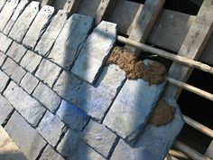 a pile of bricks sitting on top of a wooden pallet