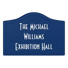 a blue sign that says the michael williams exhibition hall