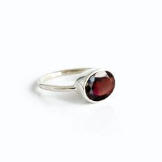 Click ⬆PERSONALIZE IT to see how your ring will look! You'll fall in love with the deep red coloring of this Garnet Quartz ring. This is a perfectly sized oval to compliment any collection. Popular as a birthday gift for those January babes and Garnet lovers alike. This is a dark, transparent red gemstone with no flaws. This stone is beautifully faceted and bezel set in a 925 sterling silver band or plated with 18k vermeil gold. Red Gemstones, January Birthstone, Garnet Ring, Oval Rings, Quartz Ring, Garnet Rings, Sterling Silver Bands, Bezel Setting, Deep Red