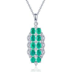 Introducing our Sterling Silver Line Necklace--an exquisite piece that beautifully showcases the timeless allure of emeralds. This Green Gemstones Bar Necklace features a Double Halo Bar Pendant, a stunning arrangement of May Birthstone Emeralds totaling 1.67 carats. The emeralds, in oval cut, form two elegant lines with a total of 10 gemstones. Adding a touch of brilliance is the sparkle of 0.268 carats of White Zircon. Crafted with precision, the pendant gracefully slides along a Silver Chain, Gemstones Pendant, Gemstone Bar Necklace, Jewelry Design Drawing, Green Hues, Silver Line, Beautiful Lines, Bar Pendant, Design Drawing, Emerald Gemstone