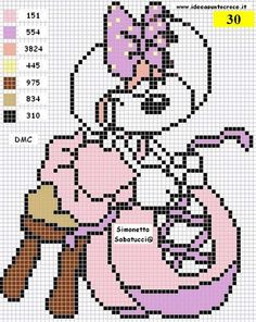 a cross stitch pattern with a snowman holding a teddy bear in it's arms