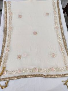 Item Overview ATHARVA Hand Embroidered/Indian Wedding Dupatta/Cream Off White Chiffon/Gota Work & Pink Thread Work/Tassels/Stole/Wrap/Sarong/Chunni/DUP24 ⚘Dno. DUP24 ⚘Hand Embroidered Gota Patti Dupatta/ Stole/ Scarf/Soft Chiffon Chinnon Dupatta ⚘Fabric Customisation: Options Available A. Net B. Organza C. Chiffon Chinnon D. Georgette E. Tabby Silk F. Pure Chiffon (Chamandi) ⚘Length: 2.5 Mtrs ⚘Width: 1.12 Mtrs ⚘Excusive Hand Embroidered Gota Patti Work ⚘Customization: * Fabrics: Designs Can be m Wedding Sharara With Embroidered Border In Georgette, White Bohemian Silk Saree, White Shawl For Traditional Ceremonies, Traditional Silk White Shawl, Traditional Drape Beige Dupatta For Ceremonies, Festive Cream Dupatta For Traditional Ceremonies, Beige Dupatta For Traditional Ceremonies, Cream Shawl-shaped Dupatta For Festive Occasions, Festive Cream Shawl-shaped Dupatta