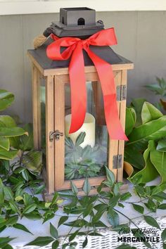 wood and metal candle lantern Entry Designs, Christmas Front Porch Ideas, Metal Bins, Metal Candle Lanterns, Wooden Adirondack Chairs, Alabaster Lamp, Entry Design