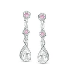 Bring sparkle to your attire with these beautiful vintage-inspired drop earrings. Crafted in sterling silver, each delightful cascading drop showcases a 7.0 x 5.0mm pear-shaped lab-created shimmering white sapphire, a 2.4mm round lab-created bright pink sapphire in a tilted square-shaped frame, and a 2.0mm round created pink sapphire adorning a hexagon-shaped bail. Intricate milgrain detailing lines each frame while two glimmering 4 x 2.5 marquise-shaped created white sapphire links lengthen thi Chandler Earrings, Prom Earrings, Peoples Jewellers, Silver Prices, Sapphire Stone, Pink Earrings, Pink Stone, White Sapphire, Pink Sapphire