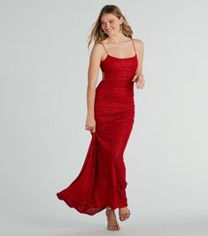 Prepare for major attention in the Britnee formal long dress﻿ that dazzles on the dancefloor in a show of glitter! She features a scoop neckline, bungee spaghetti straps, a revealing open back with a hook strap, a padded bust, and side-ruched seams that flaunt your curves along the slim silhouette down to the floor-length hem. The formal long dress is crafted from glistening glitter knit fabric with a stretchy knit lining. Complete the look with statement earrings for a black tie party or holida Red Backless Prom Dresses Open Backs, Open Back Long Dress, Formal Long Dress, Black Tie Party, Prom Dress Shoes, Homecoming Outfits, Cocktail Outfit, Outfit Wedding Guest, Long Red Dress