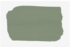 a green paint swatch on a white background, with the top half painted in dark green