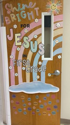 a door with the words jesus in first grade painted on it